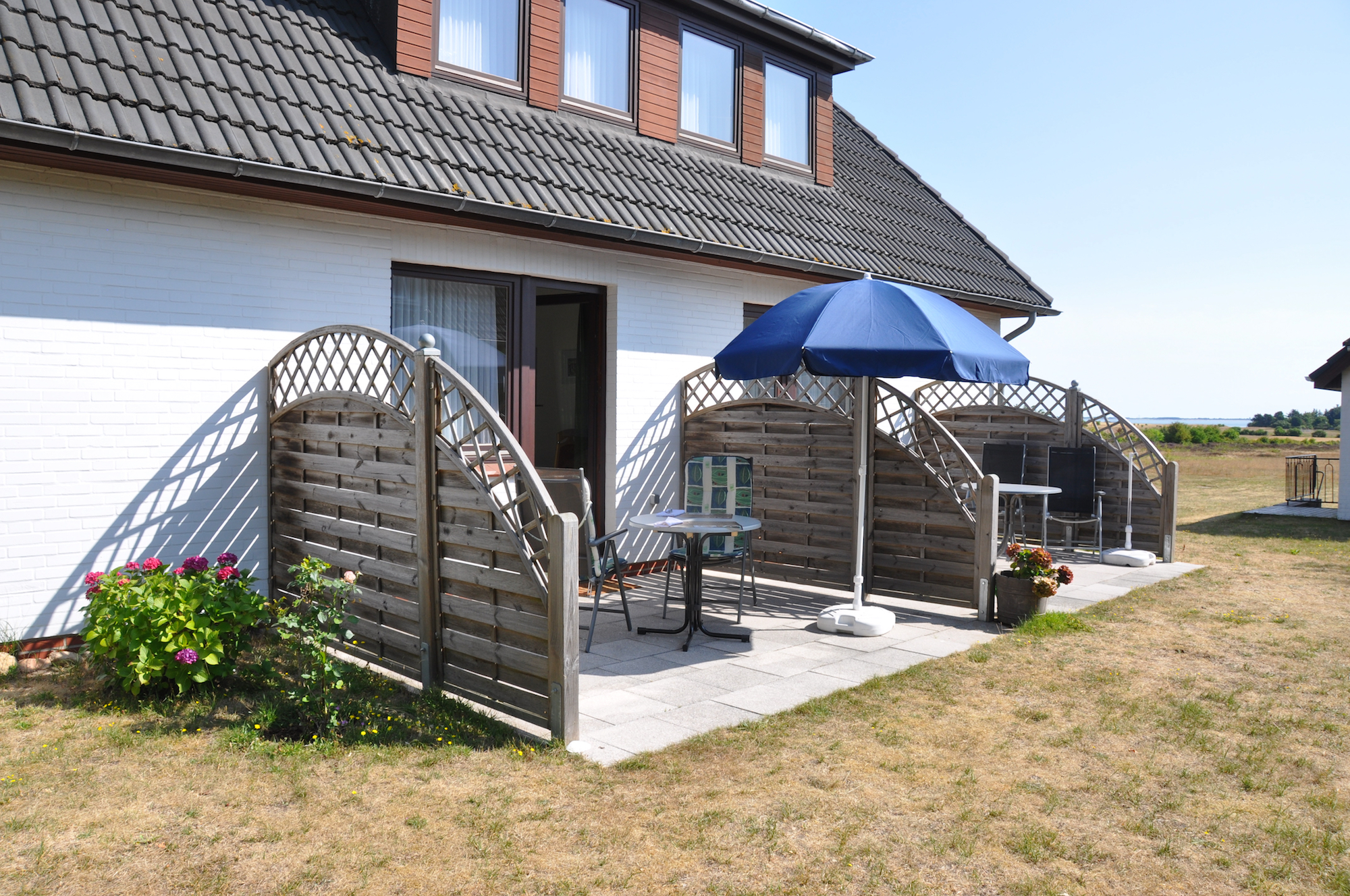Ferienwohnung Wattläufer - Gartensitzplatz